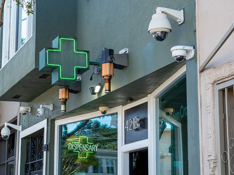 Front door of cannabis dispensary with security cameras