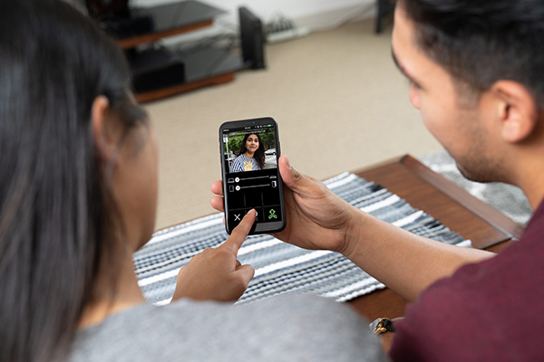 Couple using mobile app