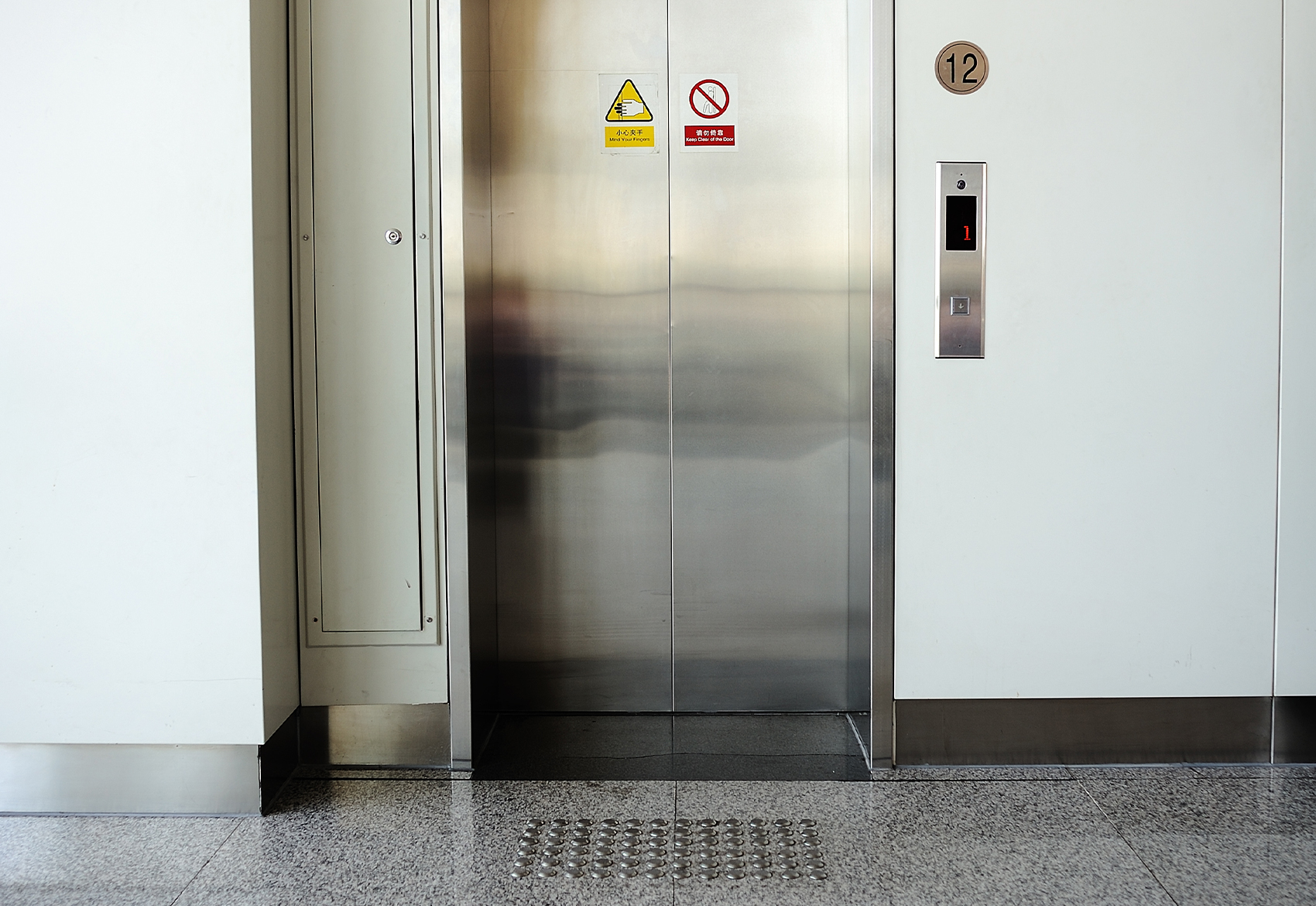 Aiphone's audio intercom systems in elevators